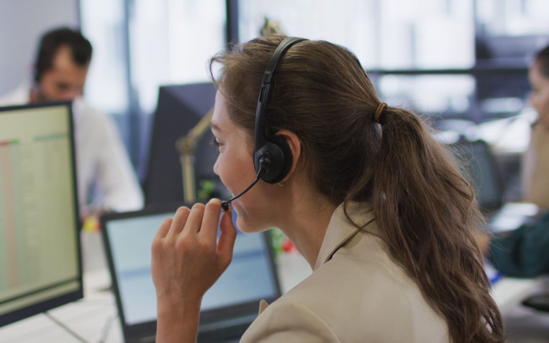 Girl at desk with headset