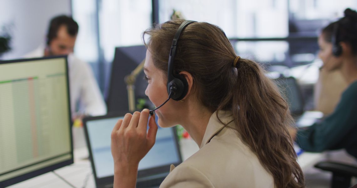 Girl at desk with headset